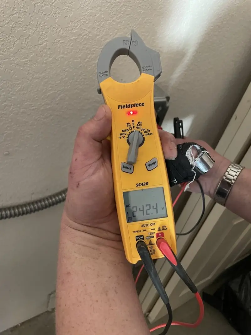 Voltage testing with clamp meter during Circuit Breaker Repair in Ballville